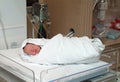 Swaddled newborn in hospital