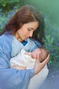 Swaddles baby Jesus in Mary`s hands Royalty Free Stock Photo