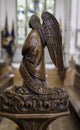 SWAFFHAM, UNITED KINGDOM - Aug 06, 2019: A beautiful and intricate angel wood carving