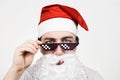 Swag Santa Claus in funny pixelated sunglasses on white background. Gangster, boss, thug life meme. 8bit style. Holly Jolly x Mas