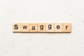 swagger word written on wood block. swagger text on table, concept Royalty Free Stock Photo