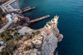 Swallow Nest aerial drone shot, ancient castle on top of mountain cliff near sea Yalta region, Crimea. Beautiful famous palace Royalty Free Stock Photo