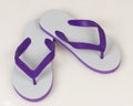 Swallow sandals white mixed with purple on a bright background. Royalty Free Stock Photo