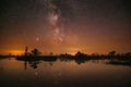 Swamp Bog Marsh Wetland Lake Nature Night Landscape. Night Starry Sky Milky Way Galaxy With Glowing Stars And Moon Royalty Free Stock Photo