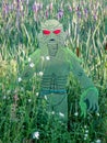 Swamp Monster Surrounded by Wildflowers Royalty Free Stock Photo