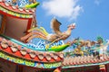 Swan and dragon sculpture decorate on the roof. Royalty Free Stock Photo