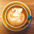 Swan - Latte Art - Coffee in blue cup Royalty Free Stock Photo