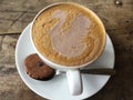 Swan latte. Coffee with cookie. Classic. Royalty Free Stock Photo