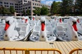 Swan Pedal Boats Docked in Urban Park with City Backdrop Royalty Free Stock Photo