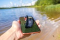 Swan on the phone. Swan on the water. Phone in the hand. Abstract photo Royalty Free Stock Photo