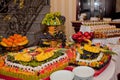 Swan from pineapple on a fruit table, decor for a wedding table