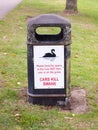 Swan sign outside on black bin do not feed Royalty Free Stock Photo