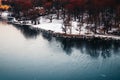 Swans flying over frozen water in the Stockholm archipelago, Sweden Royalty Free Stock Photo