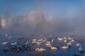 Swans lake fog sky azure winter frost Royalty Free Stock Photo