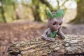 Baby Groot figure pot with forest background Royalty Free Stock Photo