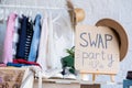 Swap party. Event for exchange of clothes, shoes, accessories. Reduce and reuse