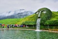 Swarovski Crystal Museum, a fountain in the form of a head covered with plants