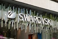 Swarovski swan symbol and logo on a store in Barcelona.