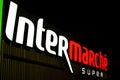 Swarzedz, Poland - December 2022: Intermarche supermarket logo sign by night