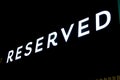 Swarzedz, Poland - December 2022: Reserved store logo by night