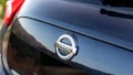 Swat, Pakistan - May 19 2023: Closeup logo of nissan car with selective focus