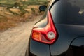 Swat, Pakistan - May 19 2023: Nissan Juke crossover brake light closeup