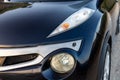 Swat, Pakistan - May 19 2023: Nissan Juke impul front headlights and parking sensor closeup view