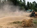 Swat, Pakistan - 24 May 2023: Wheat thresher processing and separating wheat from straw