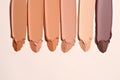 Swatches of liquid foundation makeup in different skin shades