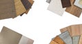 swatches and palette of material samples contains wooden engineering and vinyl flooring tiles, leather laminated, veneer, quartz