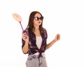 Young cute woman with fly swatter, isolated Royalty Free Stock Photo