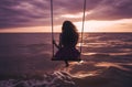 Swaying into Serenity: A Gorgeous Woman on a Sunset Swing by the Coastal Shore, ai generative Royalty Free Stock Photo