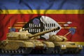 Swaziland tank forces concept on the national flag background. 3d Illustration