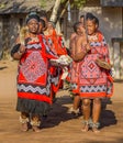 Swaziland woman singing and dancing with traditional attire clothing Swaziland