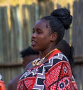 Swaziland woman singing and dancing with traditional attire clothing Swaziland.