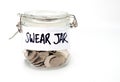 Swear jar with coins Royalty Free Stock Photo