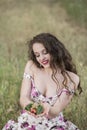 Sweat young woman holding some cherries Royalty Free Stock Photo