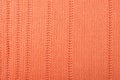 Sweater or scarf fabric texture large knitting. Knitted jersey background with a relief pattern. Braids in knitting Royalty Free Stock Photo