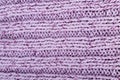 Sweater or scarf fabric texture large knitting. Knitted jersey background with a relief pattern. Braids in knitting . Wool hand- Royalty Free Stock Photo
