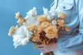 sweater woman blue floral white romantic yellow flower hand spring bouquet. Generative AI. Royalty Free Stock Photo