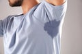 Sweaty man with stain on t-shirt Royalty Free Stock Photo