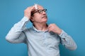 Sweaty senior man suffering from heat stroke or high temperature Royalty Free Stock Photo