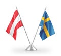 Sweden and Austria table flags isolated on white 3D rendering Royalty Free Stock Photo