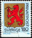 SWEDEN - CIRCA 1985: A stamp printed in Sweden shows Smaland coat of arms, circa 1985. Royalty Free Stock Photo