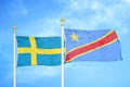 Sweden and Congo Democratic Republic two flags on flagpoles and blue sky