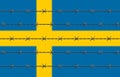 Sweden Flag Behind Barbed Wires Royalty Free Stock Photo