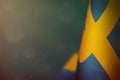 Sweden flag for honour of veterans day or memorial day. Glory to the Sweden heroes of war concept on light blue dark velvet Royalty Free Stock Photo