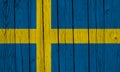 Sweden Flag Over Wood Planks