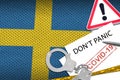 Sweden flag and police handcuffs with inscription Don`t panic on white paper. Coronavirus or 2019-nCov virus concept