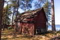 Sweden on the island within the forest with sheds Royalty Free Stock Photo